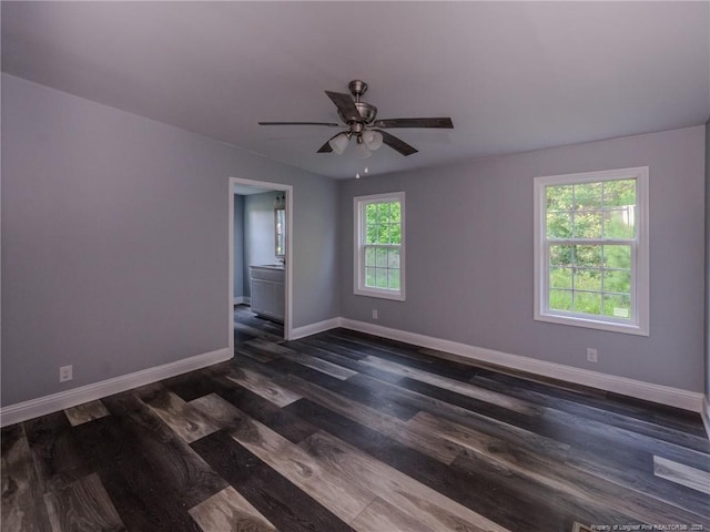 40 Ella Bell Rd, Clarkton, NC 28433 - spare room with dark wood-style floors and ceiling fan