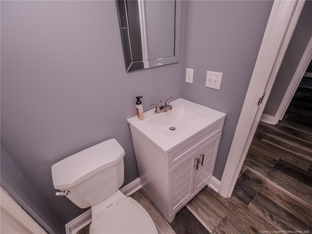 40 Ella Bell Rd, Clarkton, NC 28433 - half bathroom featuring vanity and wood finished floors