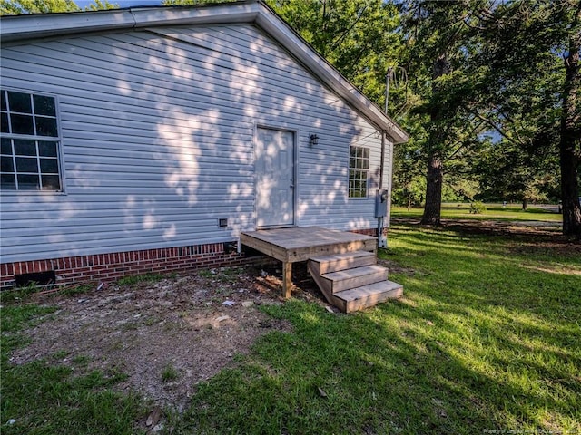40 Ella Bell Rd, Clarkton, NC 28433 - view of side of home with crawl space and a yard