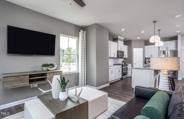 288 Fosterton Cottage Way, Raleigh, NC 27603 - living area with ceiling fan, recessed lighting, and wood finished floors