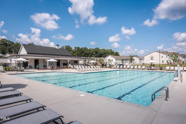 288 Fosterton Cottage Way, Raleigh, NC 27603 - community pool with a patio and a residential view