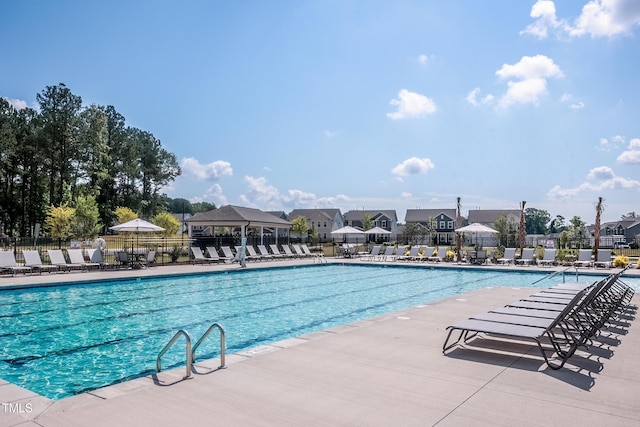 288 Fosterton Cottage Way, Raleigh, NC 27603 - community pool featuring a patio and a residential view