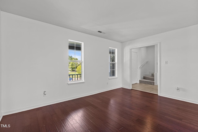 7 Hannah Ct, Durham, NC 27713 - empty room featuring stairway and wood-type flooring