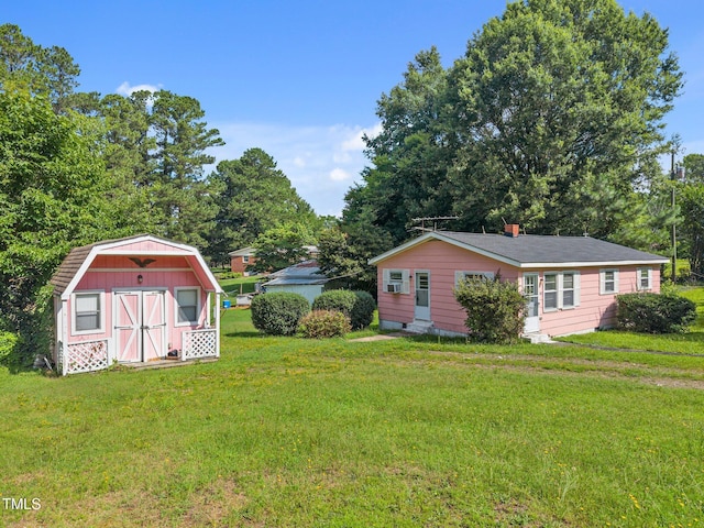150 Alston Pruitt Rd, Louisburg, NC 27549 - view of green lawn featuring a storage shed