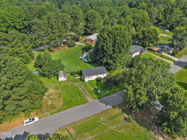 150 Alston Pruitt Rd, Louisburg, NC 27549 - aerial overview of property's location featuring a heavily wooded area