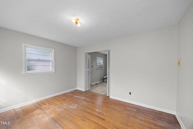 150 Alston Pruitt Rd, Louisburg, NC 27549 - spare room with light wood-type flooring, plenty of natural light, and cooling unit