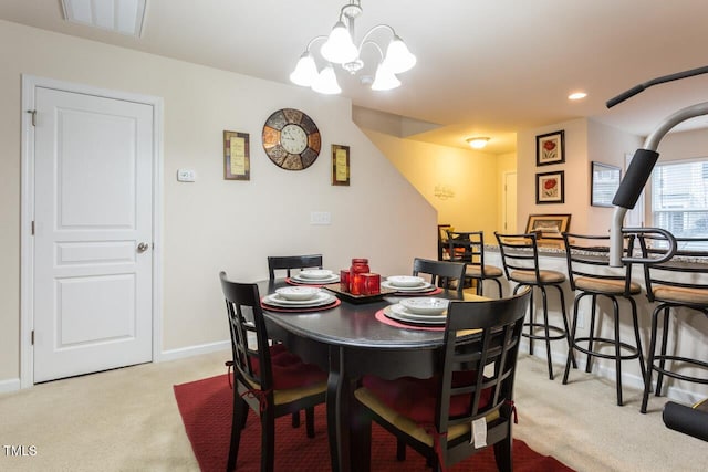 4009 Tresco Xing, Raleigh, NC 27616 - dining space featuring a chandelier, light carpet, and recessed lighting