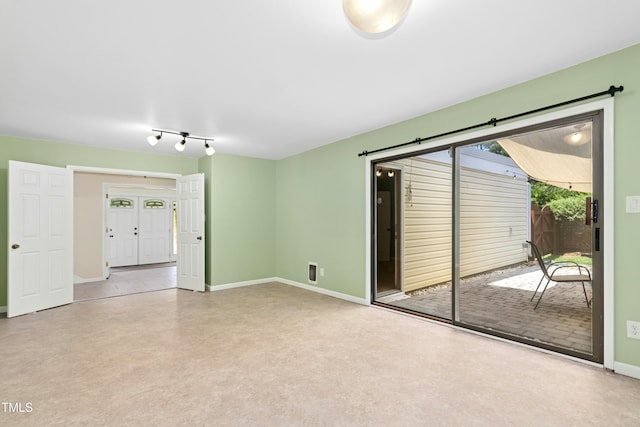 6608 Quiet Cove Ct, Raleigh, NC 27612 - spare room featuring baseboards