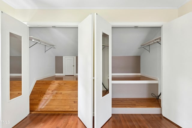 6608 Quiet Cove Ct, Raleigh, NC 27612 - spacious closet featuring wood finished floors and lofted ceiling