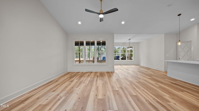 5027 Preacher Holmes Rd, Graham, NC 27253 - unfurnished living room featuring light wood-style floors, recessed lighting, a ceiling fan, and vaulted ceiling