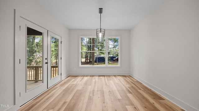 5027 Preacher Holmes Rd, Graham, NC 27253 - unfurnished dining area featuring healthy amount of natural light and light wood-type flooring