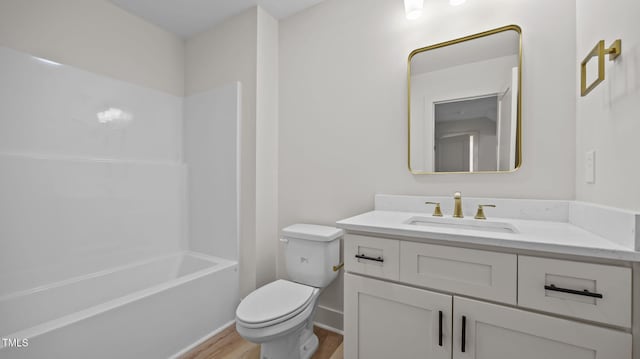 5027 Preacher Holmes Rd, Graham, NC 27253 - bathroom featuring vanity, wood finished floors, and shower / washtub combination