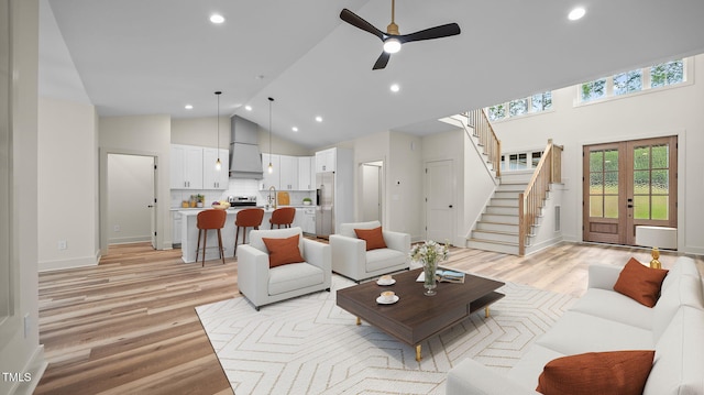 5027 Preacher Holmes Rd, Graham, NC 27253 - living room with high vaulted ceiling, light wood-type flooring, stairs, recessed lighting, and a ceiling fan