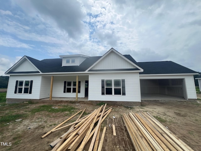 112 Lynn Ln, Selma, NC 27576 - view of front of home with an attached garage and driveway