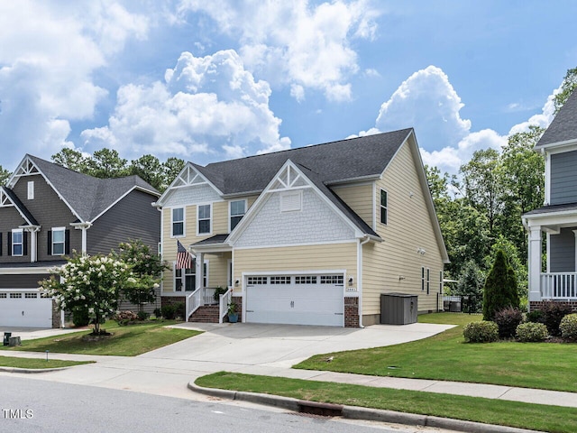 3441 Jordan Shires Dr, New Hill, NC 27562 - craftsman house featuring driveway, a front yard, and brick siding