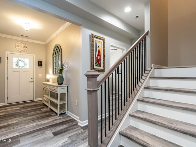3441 Jordan Shires Dr, New Hill, NC 27562 - entrance foyer with wood finished floors, crown molding, and stairs
