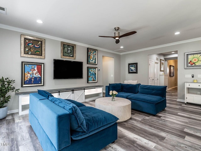 3441 Jordan Shires Dr, New Hill, NC 27562 - living area featuring recessed lighting, a ceiling fan, wood finished floors, and ornamental molding