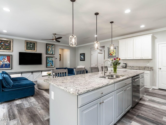 3441 Jordan Shires Dr, New Hill, NC 27562 - kitchen featuring open floor plan, crown molding, wood finished floors, recessed lighting, and an island with sink