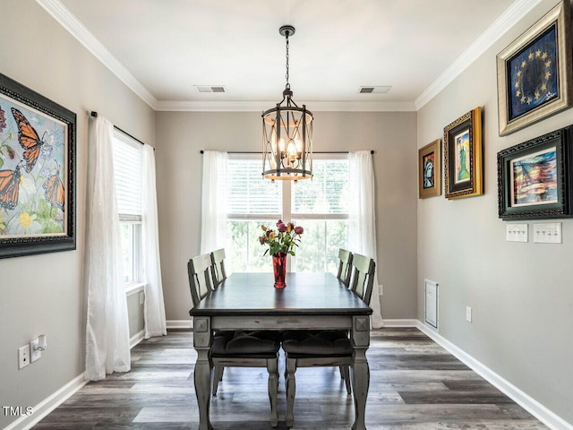 3441 Jordan Shires Dr, New Hill, NC 27562 - dining room with a chandelier, dark wood-style floors, and crown molding