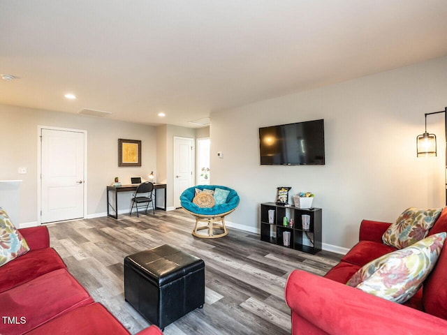 3441 Jordan Shires Dr, New Hill, NC 27562 - living room with wood finished floors, recessed lighting, and a desk