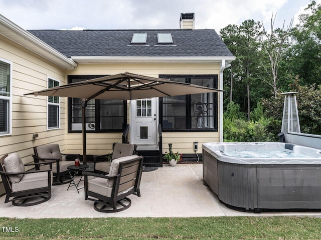 3441 Jordan Shires Dr, New Hill, NC 27562 - view of patio featuring a hot tub, a sunroom, entry steps, and an outdoor living space