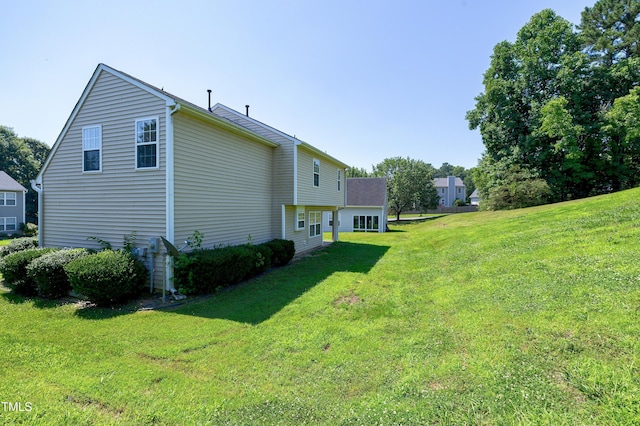 103 Bermuda Green Dr, Durham, NC 27703 - view of side of property featuring a lawn