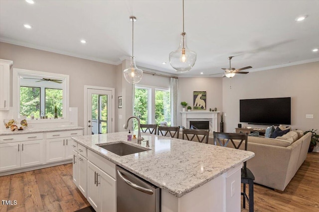 223 Chauncey Cir, Chapel Hill, NC 27516 - kitchen with dishwasher, a ceiling fan, wood finished floors, crown molding, and white cabinets