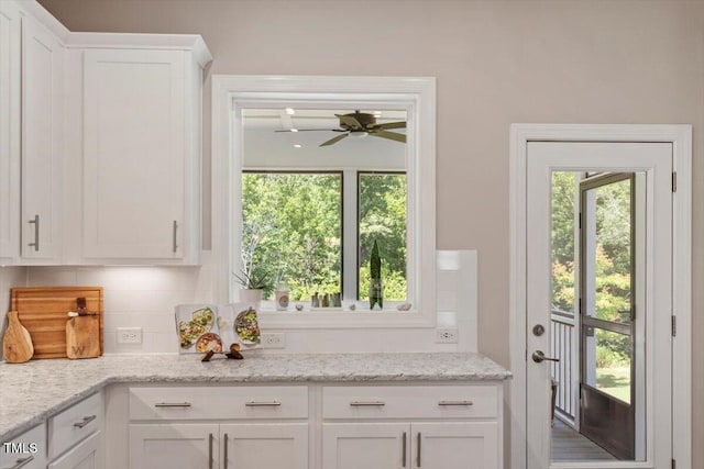 223 Chauncey Cir, Chapel Hill, NC 27516 - kitchen with white cabinets, plenty of natural light, decorative backsplash, and ceiling fan