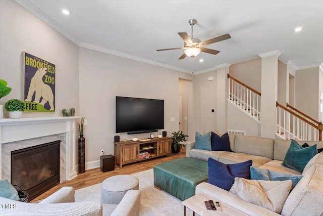 223 Chauncey Cir, Chapel Hill, NC 27516 - living area with wood finished floors, stairway, a ceiling fan, recessed lighting, and a premium fireplace