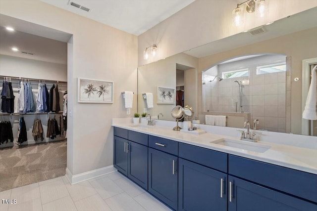 223 Chauncey Cir, Chapel Hill, NC 27516 - bathroom featuring double vanity, a walk in shower, and a walk in closet