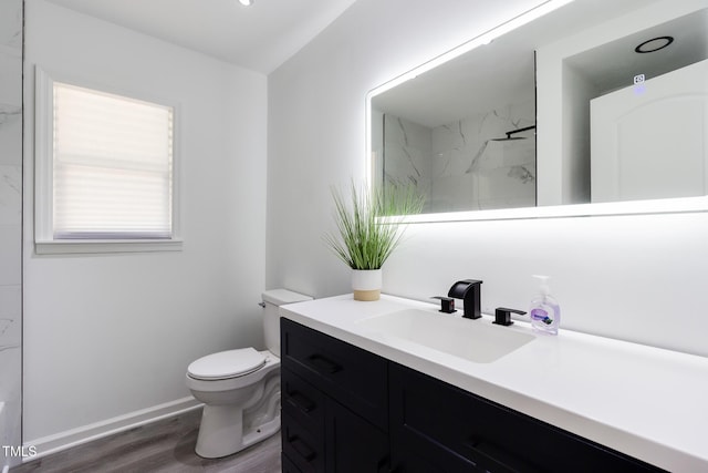 400 Minchew St SE, Wilson, NC 27893 - full bath featuring vanity, wood finished floors, and a marble finish shower