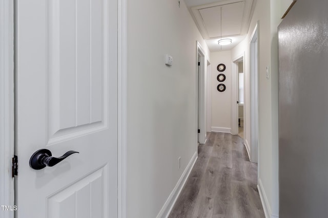 400 Minchew St SE, Wilson, NC 27893 - hallway with attic access and light wood finished floors