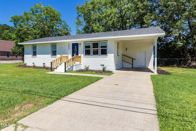 400 Minchew St SE, Wilson, NC 27893 - single story home with concrete driveway, brick siding, crawl space, a carport, and a shingled roof