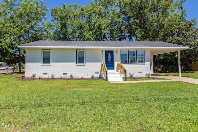 400 Minchew St SE, Wilson, NC 27893 - single story home featuring crawl space, brick siding, driveway, a front lawn, and a carport