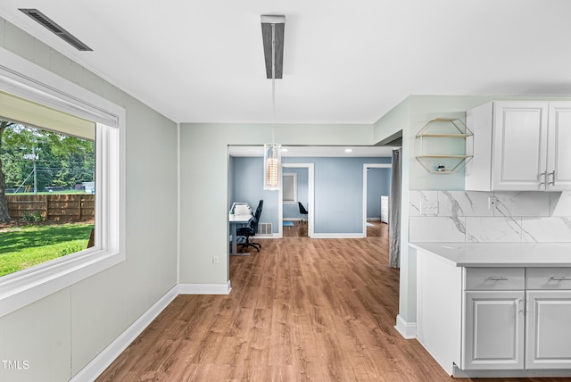 6005 Lake Wheeler Rd, Raleigh, NC 27603 - unfurnished dining area with light wood-type flooring and a desk