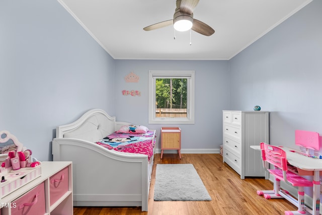 6005 Lake Wheeler Rd, Raleigh, NC 27603 - bedroom with ornamental molding, light wood-style floors, and a ceiling fan