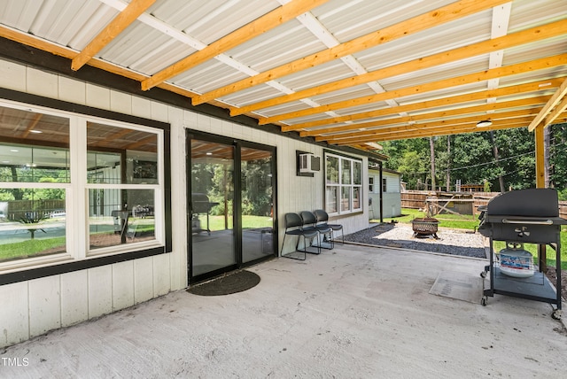 6005 Lake Wheeler Rd, Raleigh, NC 27603 - view of patio / terrace with an outdoor fire pit, grilling area, and a wall mounted AC