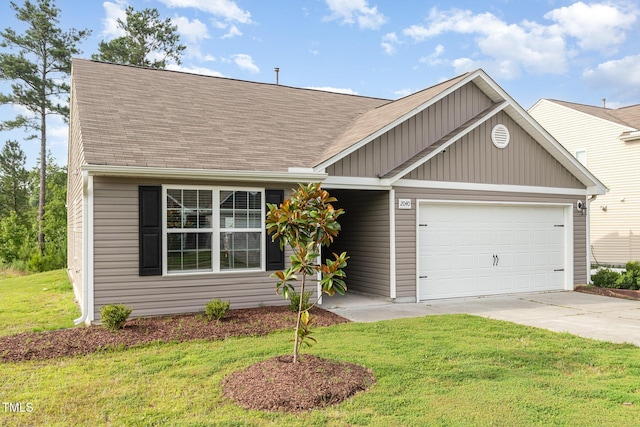 2040 Alderman Way, Creedmoor, NC 27522 - view of front of property with a garage, driveway, roof with shingles, and a front lawn