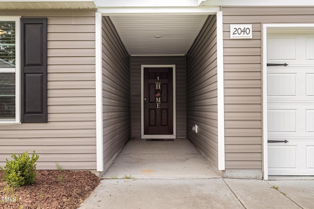 2040 Alderman Way, Creedmoor, NC 27522 - doorway to property featuring a garage