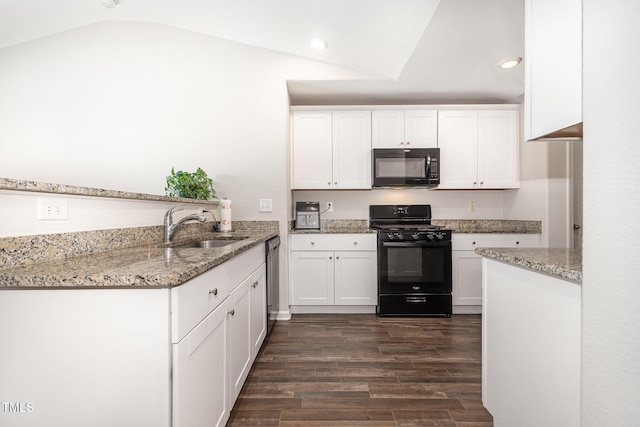 2040 Alderman Way, Creedmoor, NC 27522 - kitchen with black appliances, light stone countertops, dark wood-type flooring, white cabinetry, and recessed lighting