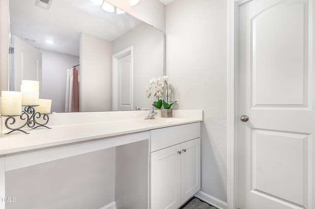 2040 Alderman Way, Creedmoor, NC 27522 - bathroom with vanity and baseboards