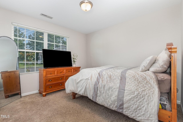 2040 Alderman Way, Creedmoor, NC 27522 - bedroom with light carpet and baseboards