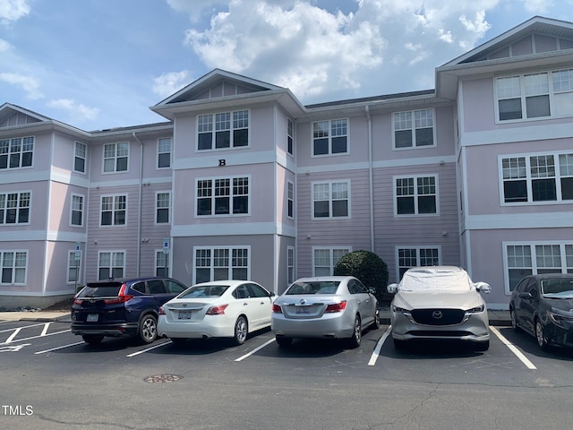 929 Morreene Rd Unit B-24, Durham, NC 27705 - view of property with uncovered parking