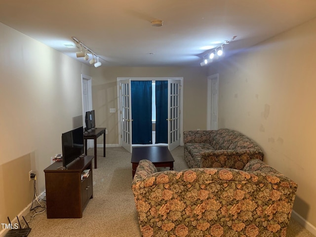 929 Morreene Rd Unit B-24, Durham, NC 27705 - living area with track lighting and light colored carpet