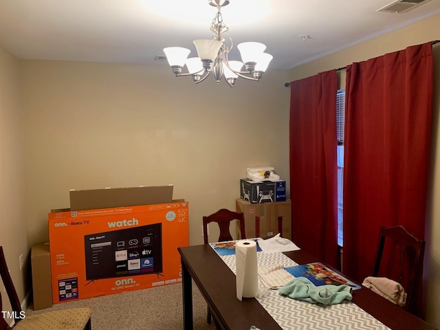 929 Morreene Rd Unit B-24, Durham, NC 27705 - bedroom featuring a chandelier and carpet floors