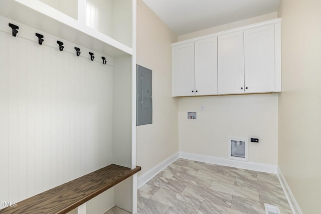 407 Kadir Womble Dr, New Hill, NC 27562 - laundry room featuring electric panel, hookup for a washing machine, cabinet space, and light marble finish flooring
