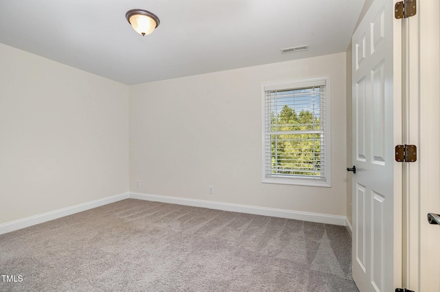 407 Kadir Womble Dr, New Hill, NC 27562 - spare room with carpet flooring