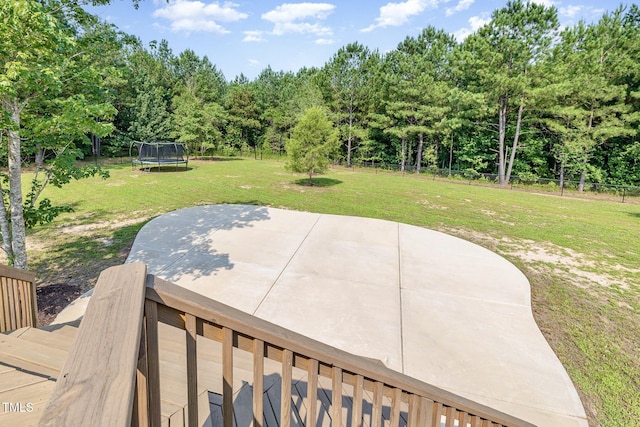 407 Kadir Womble Dr, New Hill, NC 27562 - view of patio with a trampoline