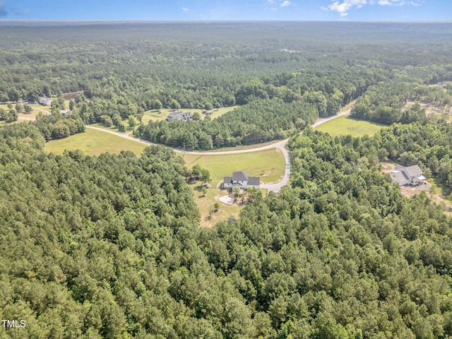 407 Kadir Womble Dr, New Hill, NC 27562 - aerial view of a heavily wooded area