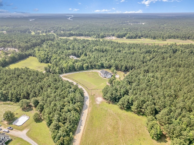 407 Kadir Womble Dr, New Hill, NC 27562 - view of property location with a heavily wooded area